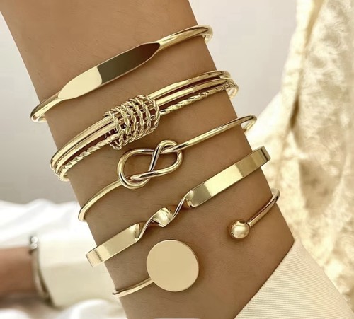 Set bracciali rigidi donna - 5,